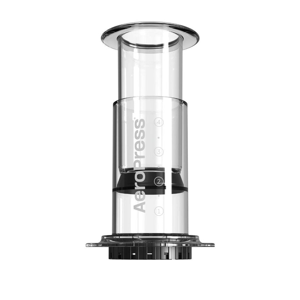 Aeropress clear coffee maker on white background