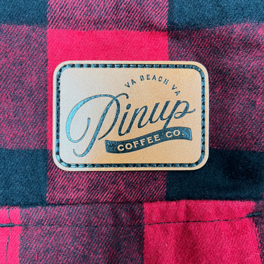 Leather patch on red and black flannel